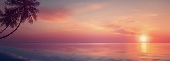 Palm Trees at Sunset Over the Ocean photo