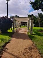 Decorative columns and the path between green spaces in the publ photo