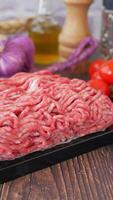 top view of beef mince and fresh vegetables on table video