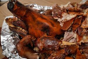 a large amount of meat on a piece of aluminum foil photo
