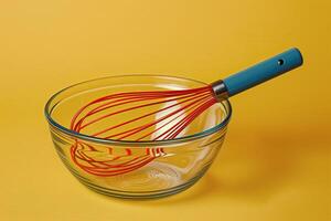 Red Handle Whisk in Glass Bowl photo
