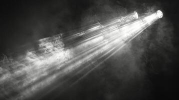 Three Spotlights Illuminating Clouds photo