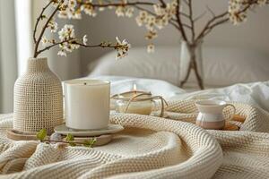 Cup of Coffee on Plate on Bed photo