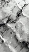 Detailed Close-Up of Black and White Marble Texture photo