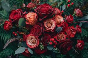Bouquet of Red and Pink Roses With Greenery photo