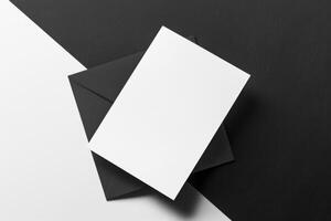 Blank business cards on black background. Mockup for branding identity. photo