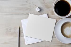 Office desk table with blank paper and coffee cup. Top view with copy space photo