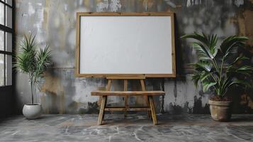 Wooden easel with blank canvas on the wall. photo