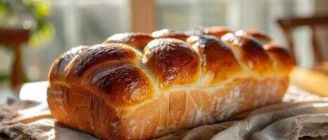 Loaf of Bread on Wooden Table photo
