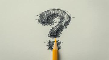 Pencil Sketch of Question Mark on Paper photo