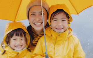 Mother And Daughters Under Umbrella On Rainy Day photo