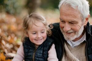 Grandfather and Granddaughter Laugh in Autumn photo