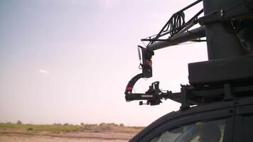 Filming in the steppe. The operator moves the camera along the slider. Movie production video
