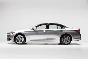 Mid size sedan photographed against white  in  studio ing on its fuel efficiency and environmental features background photo