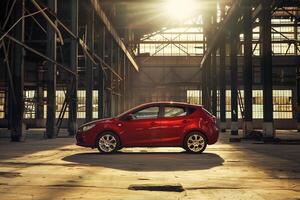 Subcompact hatchback in modern industrial setting with steel beams and  diffused lighting background photo