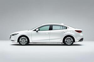 Compact sedan in studio with clean white background showcasing its sleek design photo