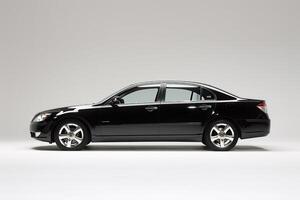 Prestige Full size sedan captured in white walled studio space emphasizing its executive appeal and high end features photo