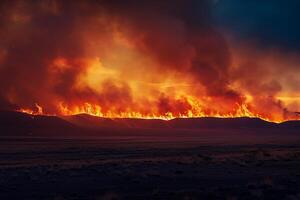 Wildfire Desert Background Wildfire raging across dry desert landscape casting fiery glow against the dusk sky. photo