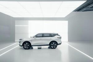 Luxury SUV presented on white stage with  even lighting and clean background to highlight its modern design and spacious interior photo