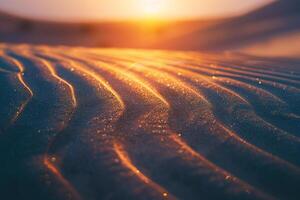 Ethereal patterns of light and shadow on sand dune at sunset with wind creating delicate ripples nature background photo
