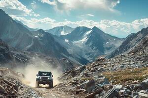 Off Road Vehicle Crossing Rugged Terrain with Rocky Mountains in Background   nature background photo
