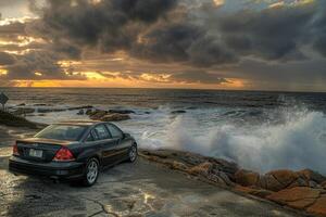 Compact Sedan on Scenic Coastal Highway with Ocean Waves Crashing on Rocks and Dramatic Cloudy Sky Background in Nature photo
