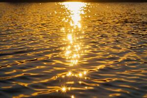 Seascape Sunlight Casting Golden Glow on the Surface of Lake nature background photo