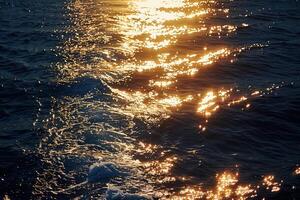 Seascape Sunlight creating shimmering path on the surface of the sea during sunset  nature background photo