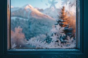 nature background Frost Patterns on Windowpane Framing Snowy Mountains photo