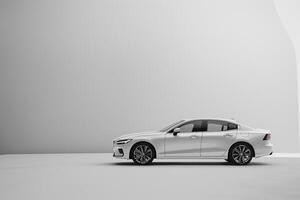 Elegant sedan parked on a seamless white studio background with clean design background nature photo