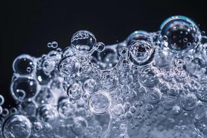 Abstract of Bubbles Trapped in Ice Creating Pattern Against Dark Background photo