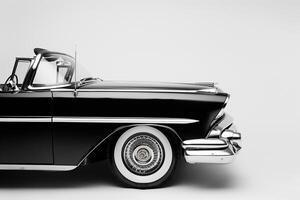 Restored Vintage Car on Plain White Background Emphasizing Timeless Design and Craftsmanship photo