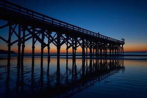 Pier Silhouetted Against Twilight Sky Nature Background photo