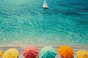 beach umbrellas lining the shore with clear turquoise waters and a distant sailboat on the horizon nature background photo