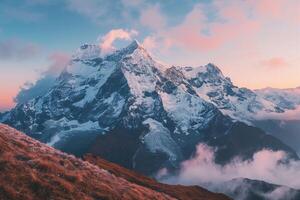 Snow capped peaks at sunrise nature background photo