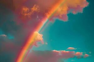 Rainbow Against Cloudy Sky After Rain Nature Background photo