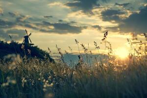Hilly countryside with windmill. charming nature scene with background nature photo