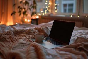 Comfortable Laptop Mockup Background on a  Bed with Blanket and Coffee for Home Use photo