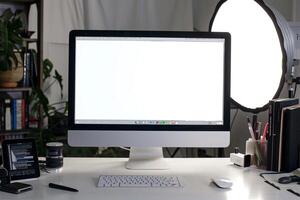 Computer Mockup Background on White Desk with  Editing Tools photo