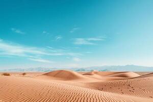 Desert Dunes Under a Blue Sky with Distant Mountains for Desert Exploration graphy Background photo