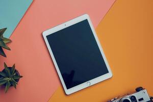 Tablet screen mockup with    background highlighting new tech features and advanced design elements background photo