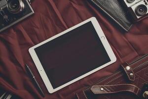 Tablet Mockup with Leather Notebook for  Design Background photo