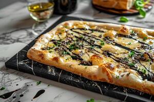 Stylish Gourmet Pizza with Truffle Oil on  Marble Table  Food Presentation photo