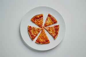 Pizza Slices Arranged Asymmetrically on Plate photo