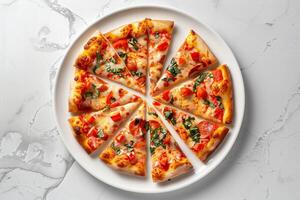 Pizza slices arranged in a circular pattern on a ceramic plate photo