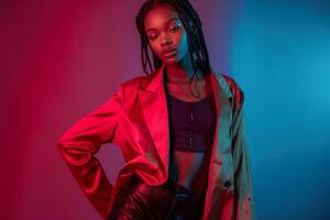 Model in High Fashion Ensemble with Rich Burgundy Background photo