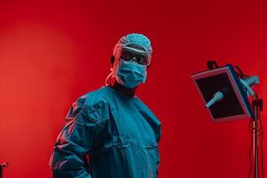 Surgeon in action pose showcasing medical expertise and skillful execution during surgery in a clinical background photo