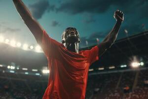 Soccer Player Celebrating Goal with Empty Stands Low Perspective photo