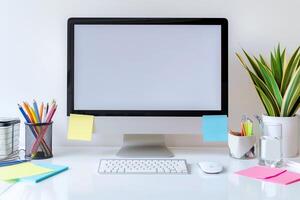 White desk with computer mockup and sticky notes perfect for presenting digital concepts and ideas background photo