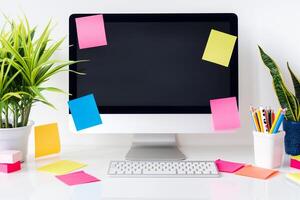 Computer mockup with sticky notes and a cup of coffee on a white desk ideal for work and relaxation background photo